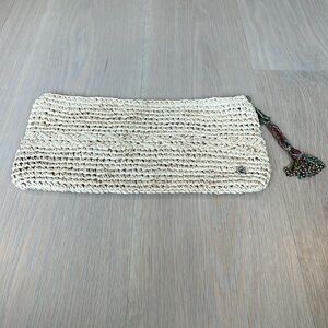 Straw clutch by Flora Bella